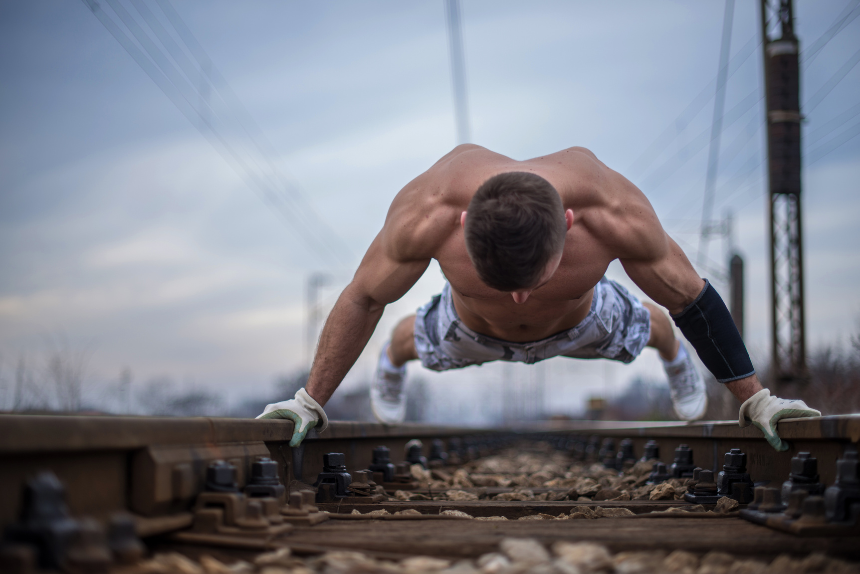 Calisthenics on railroad tracks.